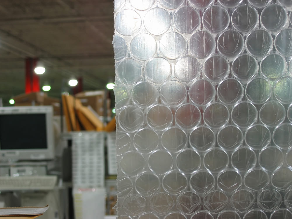 warehouse with products packaged in bubble wrap